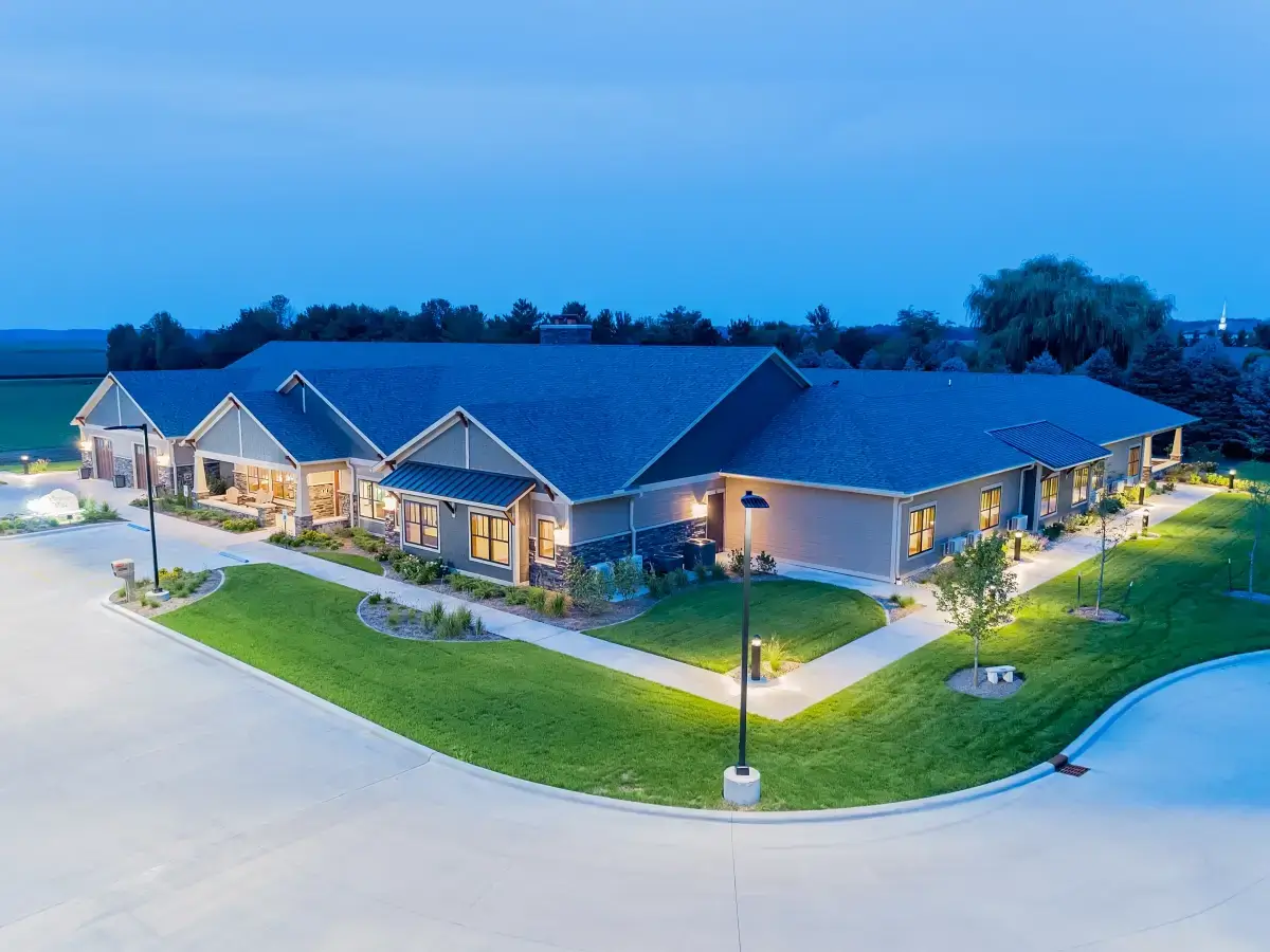 Aerial drone photo of a commercial building and landscaped grounds at dusk, Central Illinois